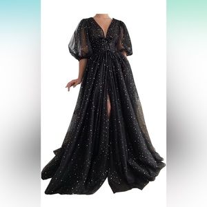 Elegant black stary dress. Fluffy sleeves, corset back, and plunging neckline.